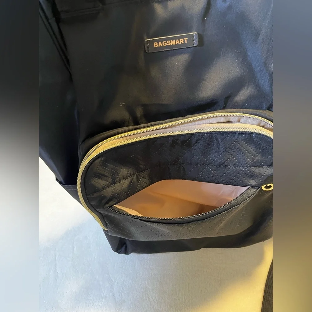 Black Quilted Travel Backpack with Gold Trim